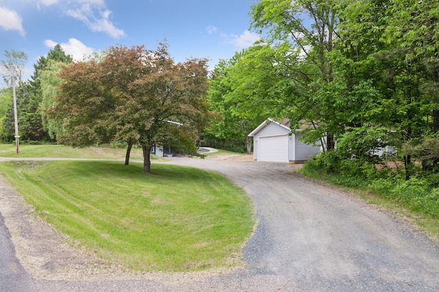 1524 Mulberry St, Taylors Falls, MN 55084 - obstructed view of property with an outdoor structure, a front lawn, and dirt driveway