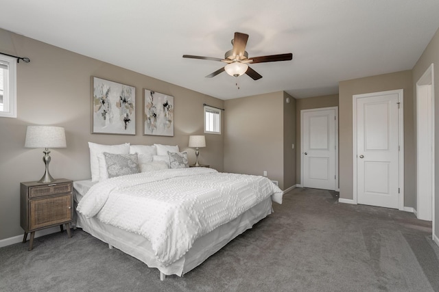 carpeted bedroom with ceiling fan