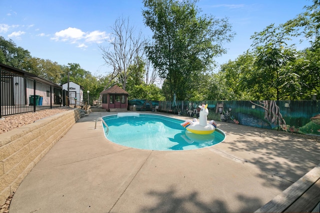 view of pool with a gazebo and a patio