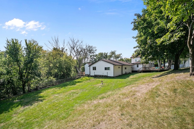 view of yard with a wooden deck