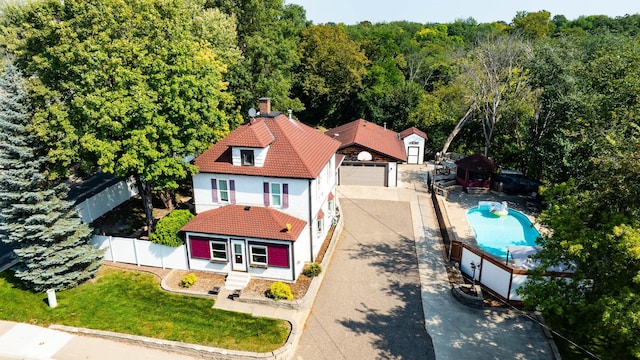 304 Main St S, Saint Michael, MN 55376 - view of subject property featuring a forest and a pool area