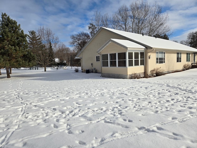 view of snow covered property