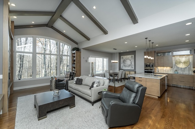 living room with lofted ceiling with beams, recessed lighting, dark wood-style floors, and baseboards