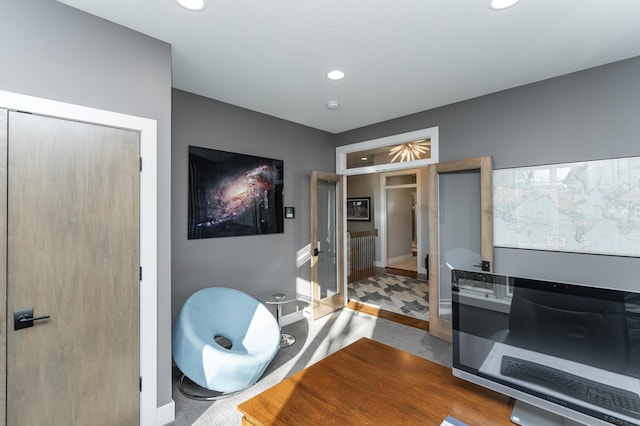 bathroom with recessed lighting and baseboards