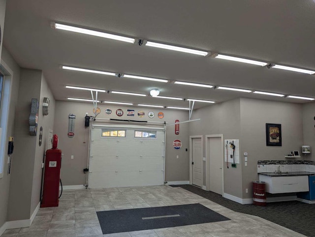 garage featuring baseboards