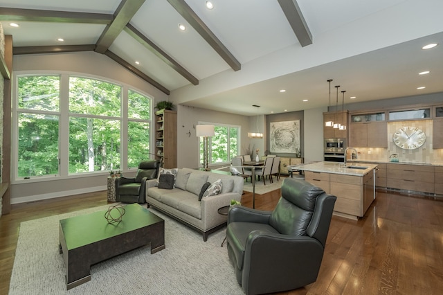 living area featuring dark wood finished floors, lofted ceiling with beams, recessed lighting, and baseboards