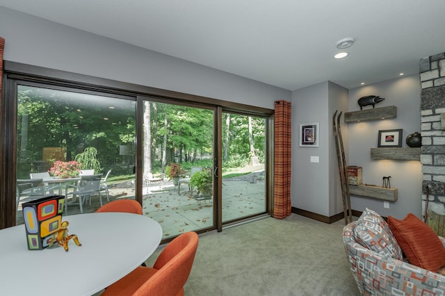 entryway with recessed lighting, baseboards, and carpet floors