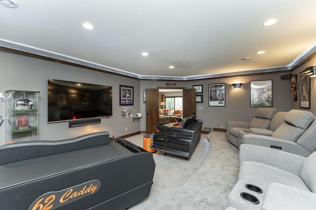 living area featuring recessed lighting, light carpet, and baseboards
