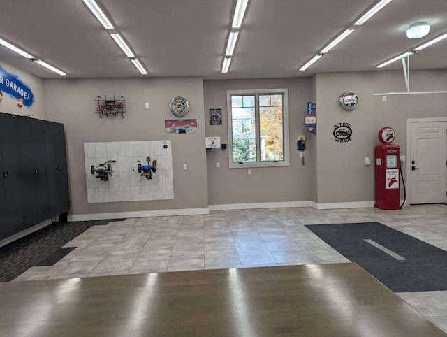 garage featuring baseboards
