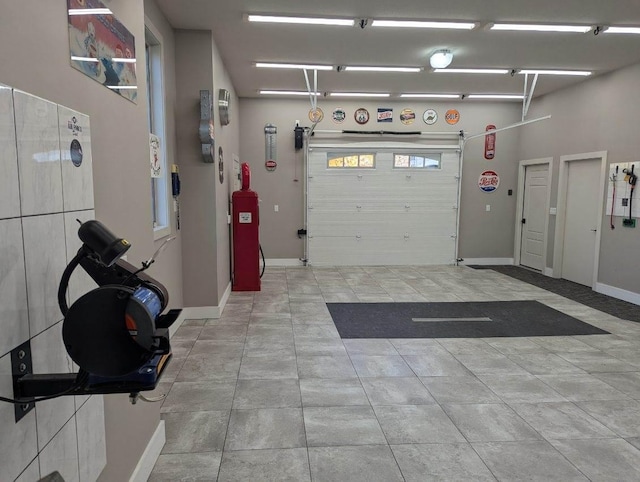 garage featuring baseboards