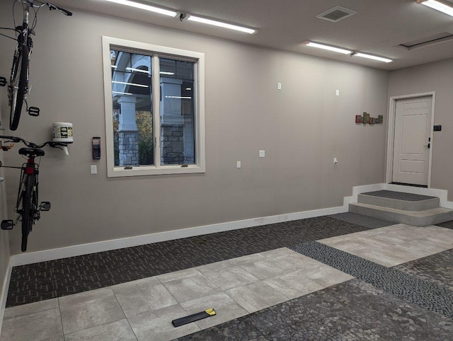 garage with baseboards