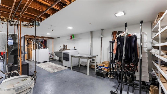 basement with washer / clothes dryer and sink