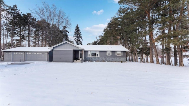 single story home with a garage