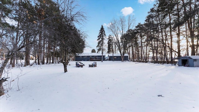 view of yard covered in snow