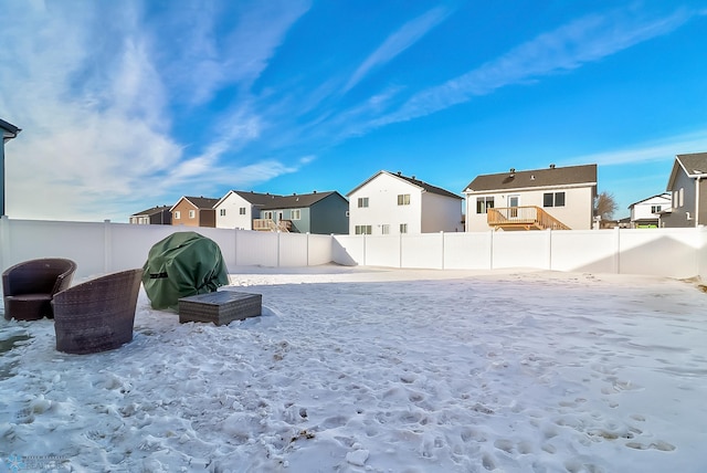 view of yard covered in snow