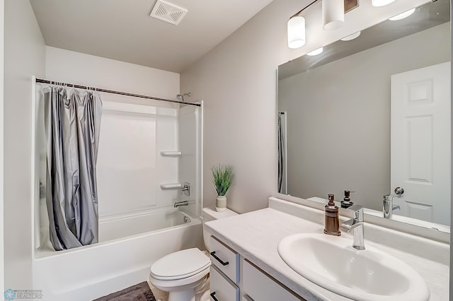 full bathroom with vanity, shower / bath combination with curtain, and toilet