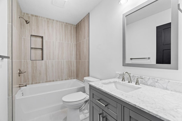 full bathroom with vanity, a textured ceiling, tile patterned floors, shower / bathtub combination, and toilet