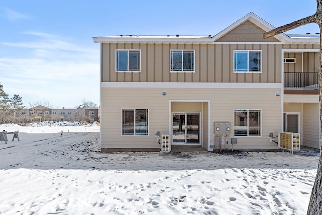 view of snow covered house