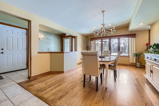 10740 230th St N, Scandia, MN 55073 - dining room with a chandelier and light wood finished floors