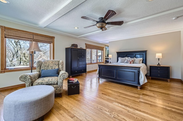 10740 230th St N, Scandia, MN 55073 - bedroom featuring a textured ceiling, light wood finished floors, beam ceiling, a ceiling fan, and recessed lighting