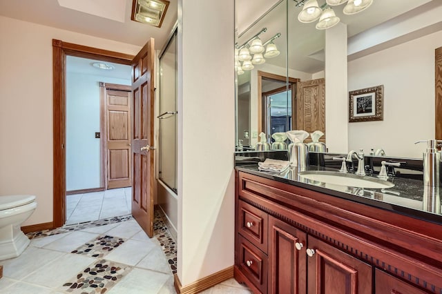 10740 230th St N, Scandia, MN 55073 - bathroom with vanity, tile patterned flooring, and combined bath / shower with glass door