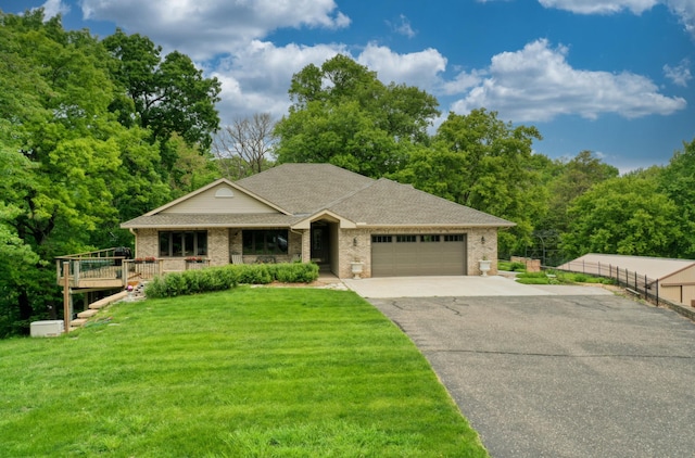 10740 230th St N, Scandia, MN 55073 - ranch-style house featuring asphalt driveway, a garage, brick siding, and roof with shingles
