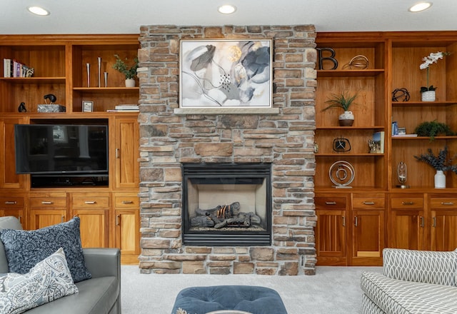 3942 Autumn Lake Ct SW, Rochester, MN 55902 - carpeted living area featuring recessed lighting and a stone fireplace