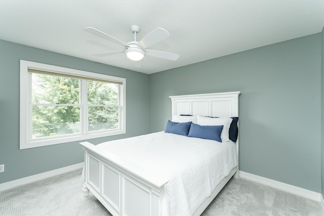 3942 Autumn Lake Ct SW, Rochester, MN 55902 - bedroom with light colored carpet and a ceiling fan
