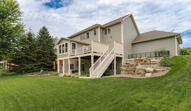3942 Autumn Lake Ct SW, Rochester, MN 55902 - rear view of property with stairs, a deck, a lawn, and roof with shingles