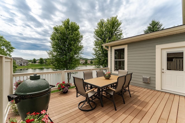 3942 Autumn Lake Ct SW, Rochester, MN 55902 - wooden terrace with a water view and outdoor dining space
