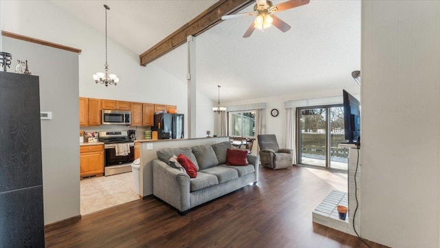 living room with beamed ceiling, ceiling fan with notable chandelier, high vaulted ceiling, and dark wood-style flooring