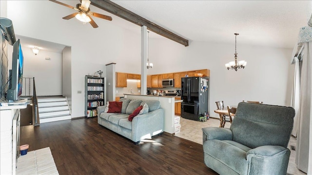 living room with stairway, high vaulted ceiling, beamed ceiling, and wood finished floors