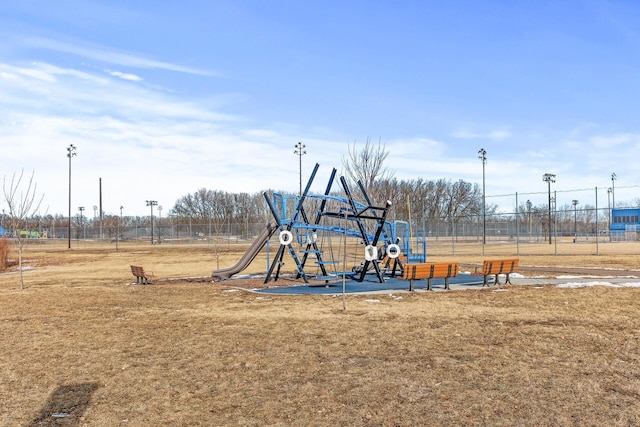 view of jungle gym with a lawn