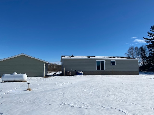 view of snow covered house