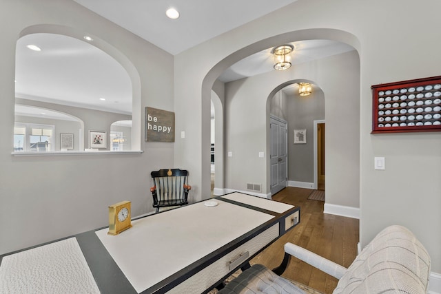 office area featuring baseboards, wood finished floors, visible vents, and recessed lighting