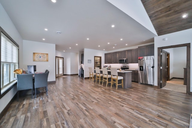 dining area with dark wood-type flooring