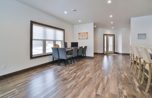 dining room featuring wood-type flooring