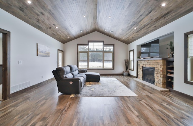 living room featuring high vaulted ceiling, dark wood-type flooring, a fireplace, and wood ceiling