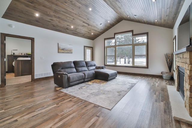 living room with dark wood-type flooring, a fireplace, high vaulted ceiling, and wooden ceiling