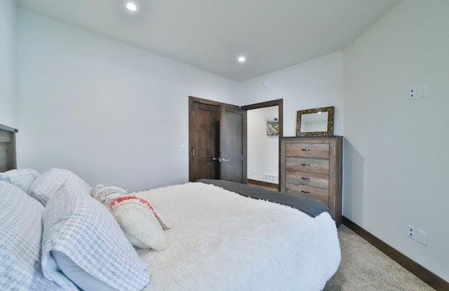 bedroom featuring carpet