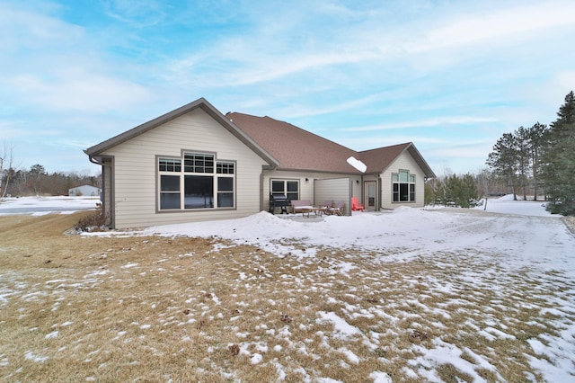 view of snow covered property