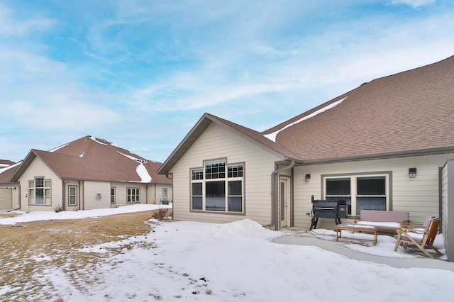 view of snow covered property