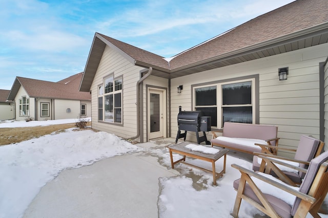 view of snow covered patio