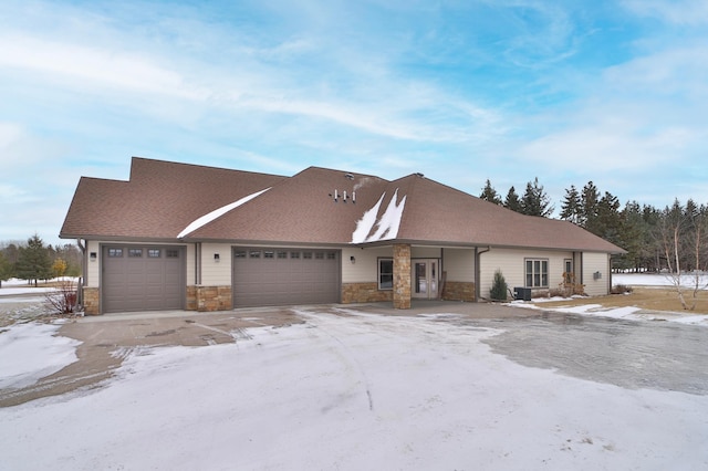 view of front of property with a garage