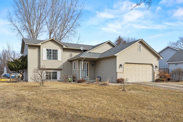 split level home featuring a garage, a shingled roof, brick siding, concrete driveway, and a front lawn