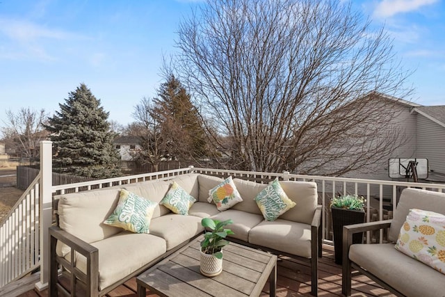 wooden deck with outdoor lounge area