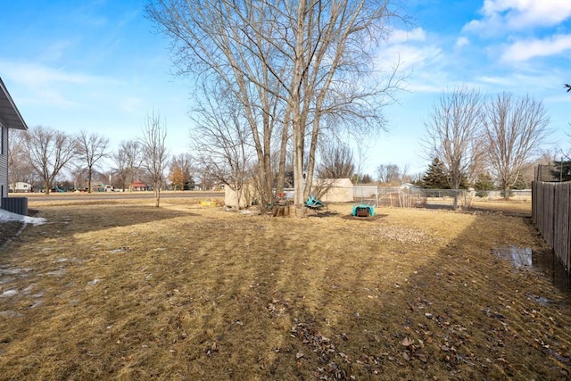 view of yard with fence