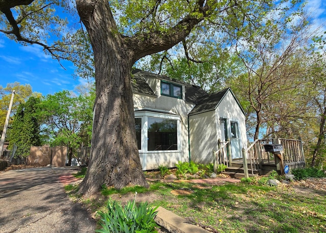 3343 Drew Ave N, Robbinsdale, MN 55422 - view of front of house featuring a deck and fence