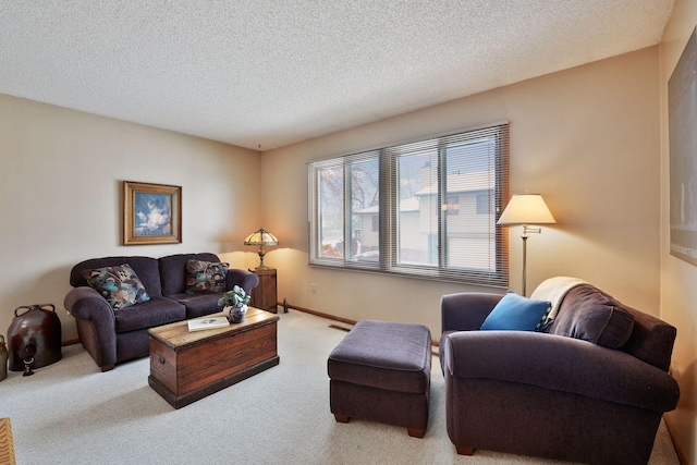 carpeted living area with a textured ceiling, visible vents, and baseboards