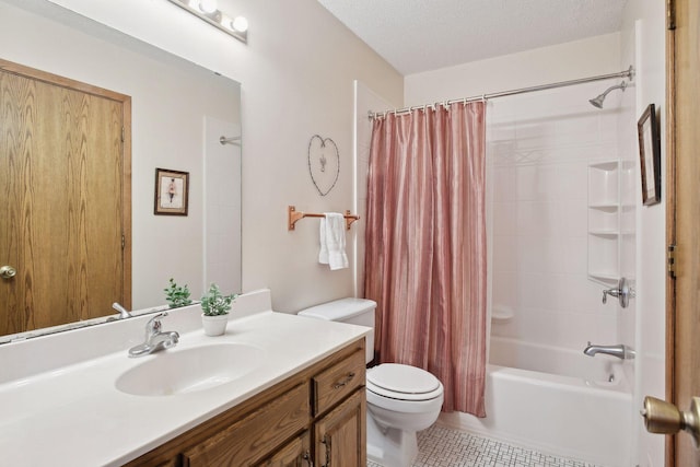 full bathroom featuring toilet, vanity, tile patterned floors, shower / bath combination with curtain, and a textured ceiling